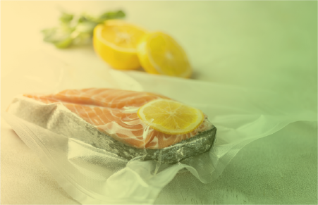 Salmon being cooked in a bag using sous vide method