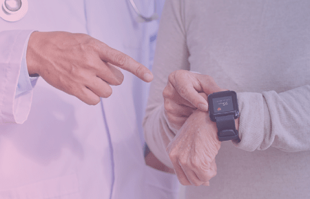 Doctor and patients looking at smart watch